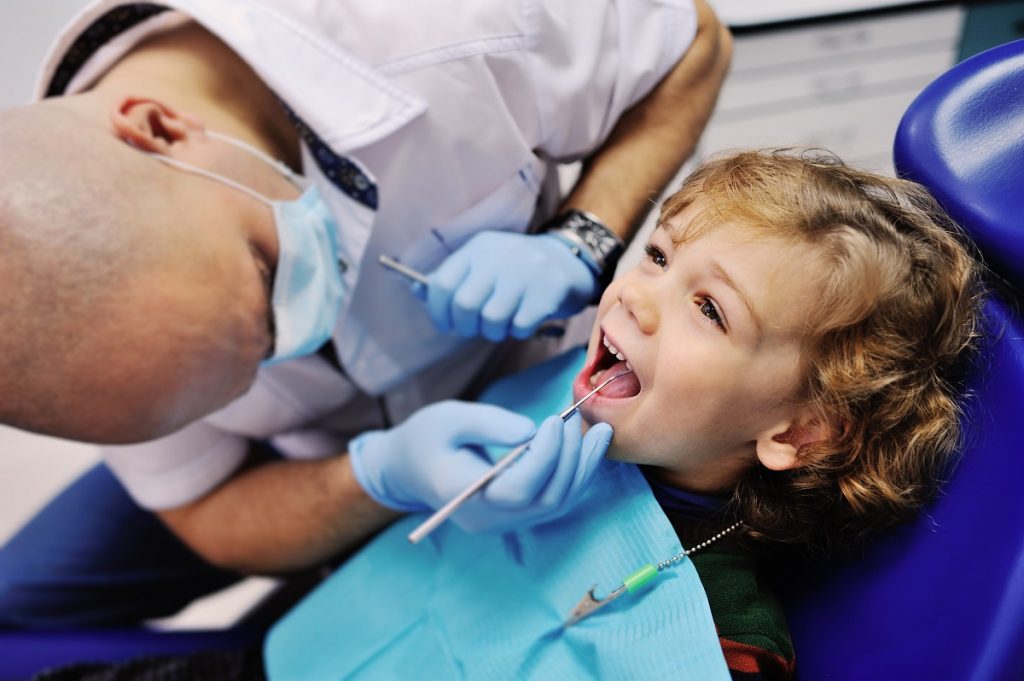 kid having dental treatment