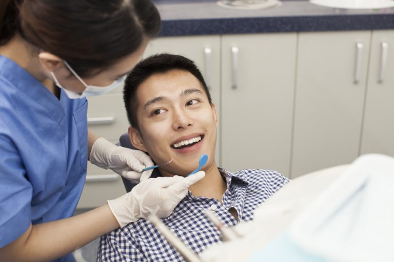 Male patient at the dentist