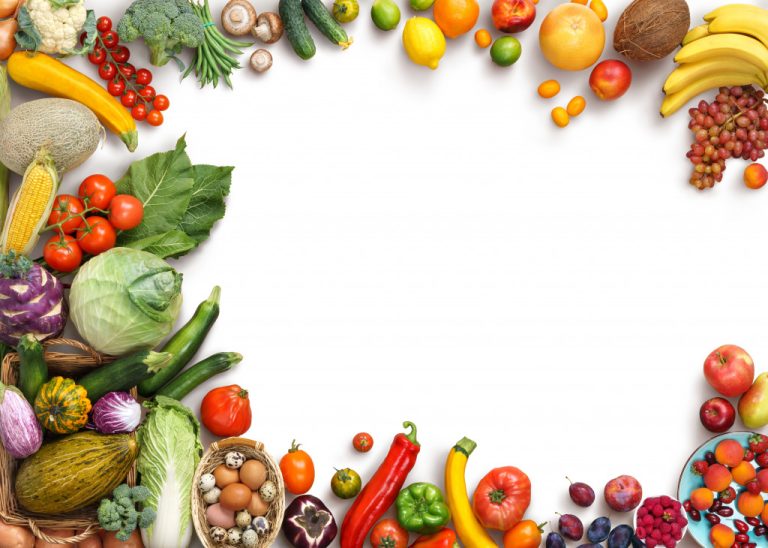 fruit and vegetables laid out in a table