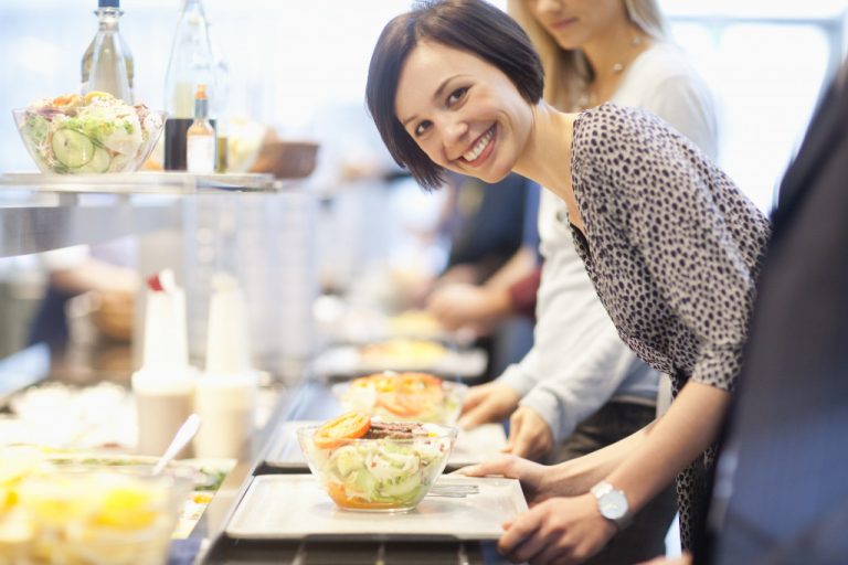 happy employee in company cafeteria